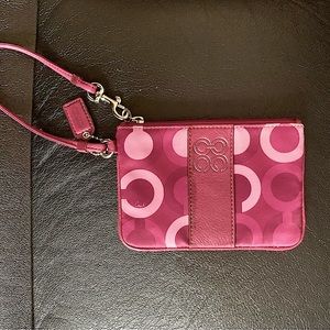 Signature Coach Wristlet
Shades of Pink & Purple with Silver Hardware
